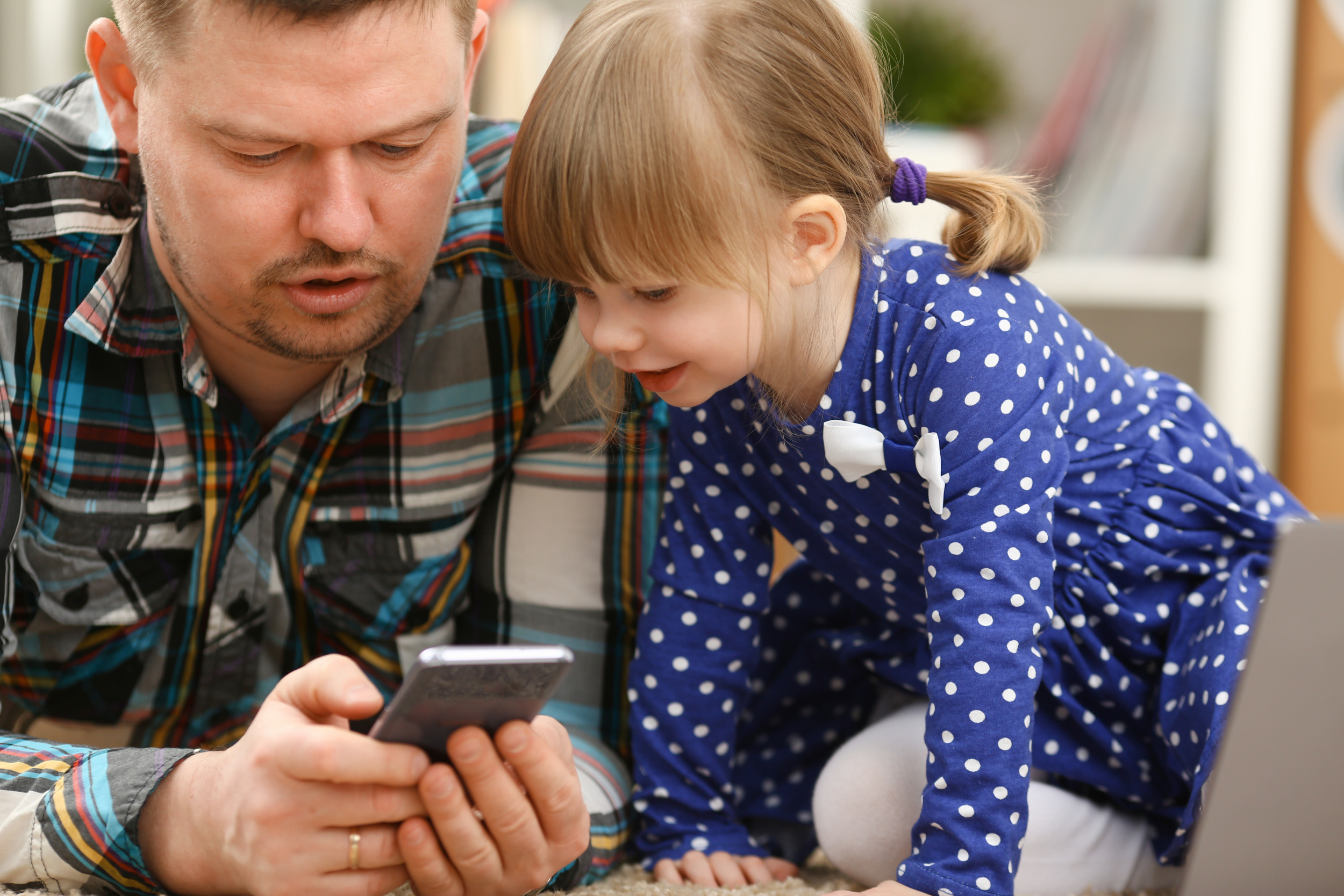 cute-little-girl-floor-carpet-with-dad.jpg
