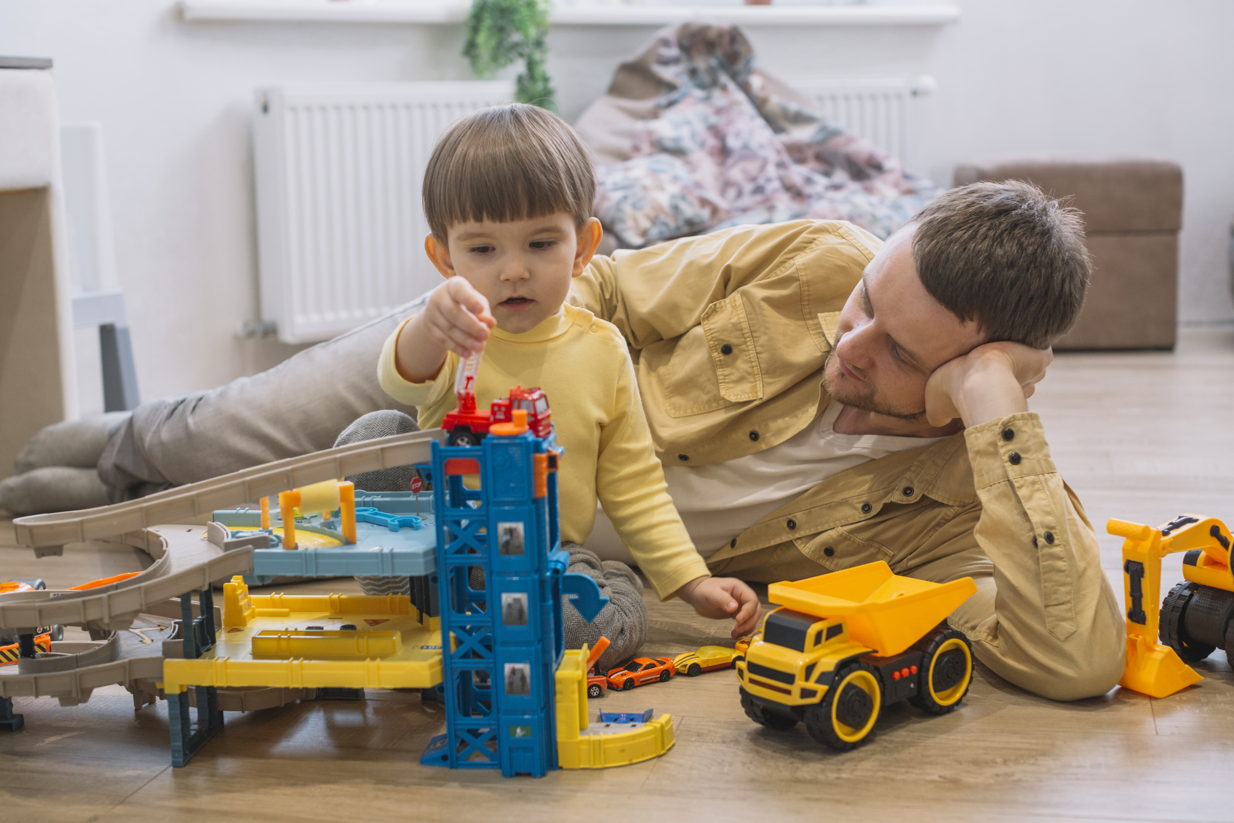 05 father-son-playing-with-toy-cars.jpg