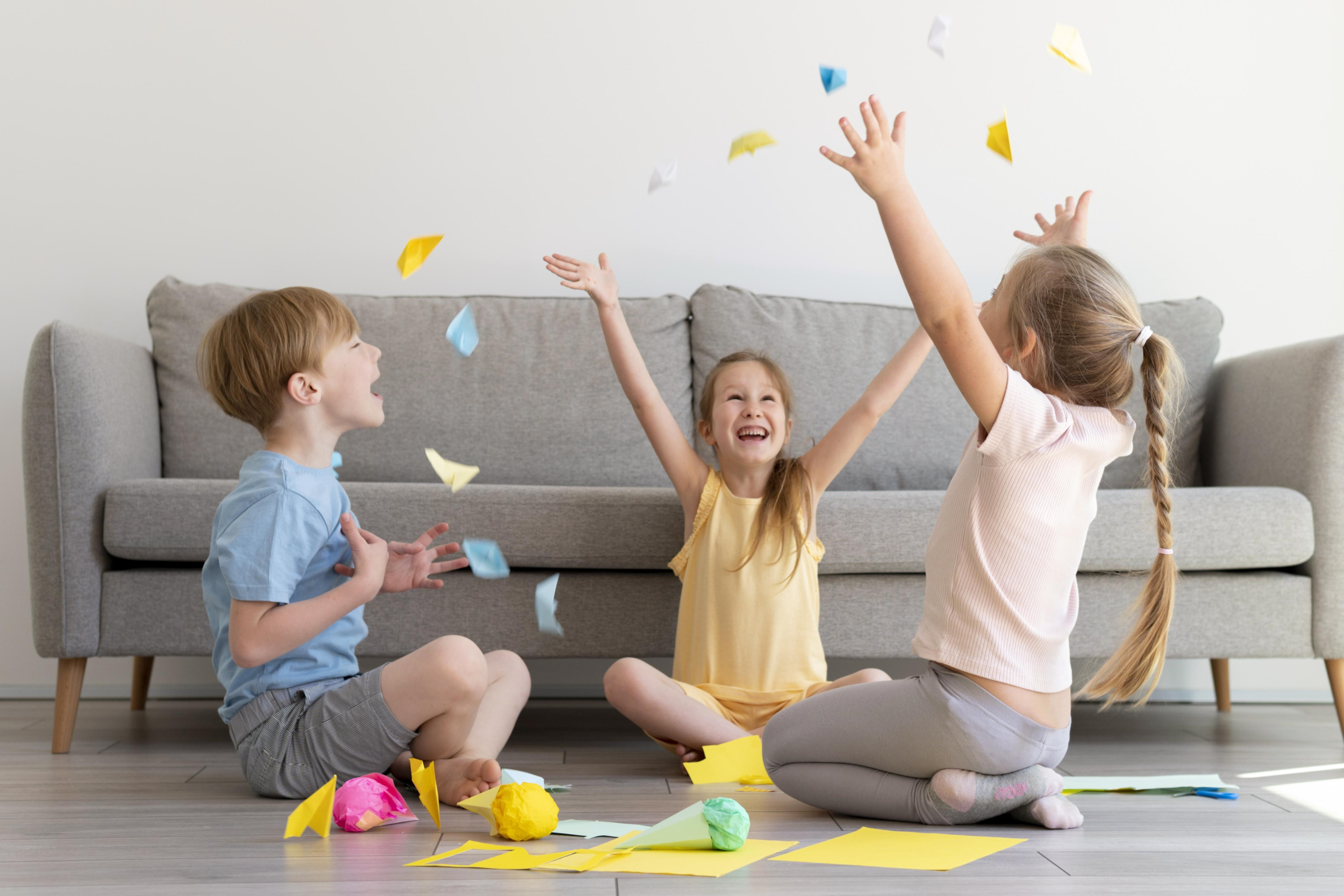 1 full-shot-kids-playing-with-paper.jpg 1 full-shot-kids-playing-with-paper.jpg