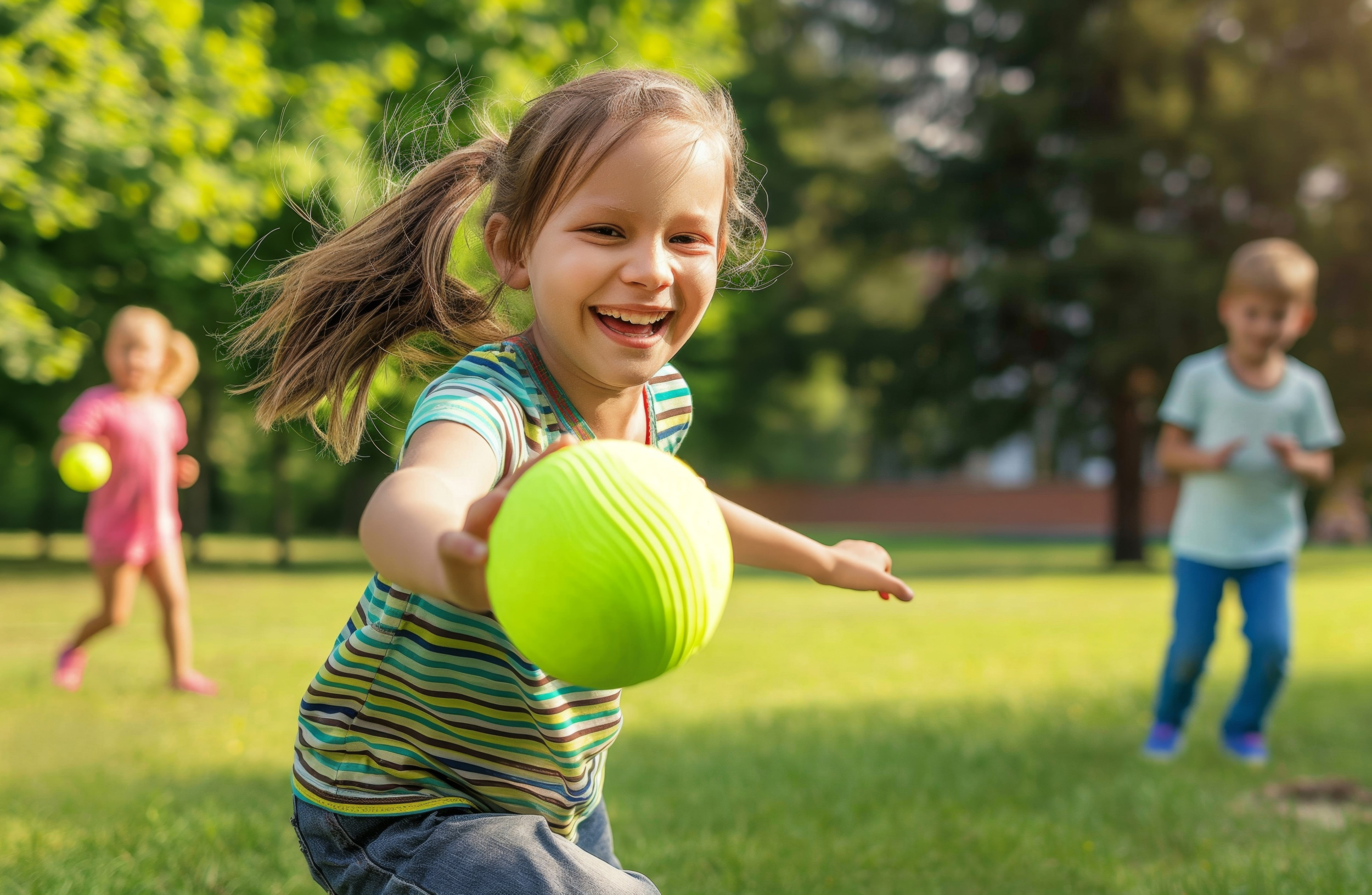 03 happy-children-playing-with-ball-park.jpg
